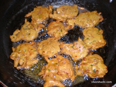 view of pakore just after pouring in the oil 